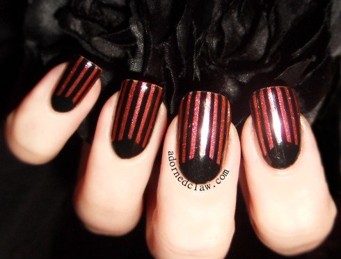 black and glittery half moon nails