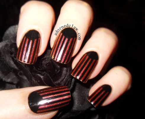 black and glittery half moon nails